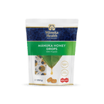 Manuka Health Manuka Honey Drops packaging on a green background