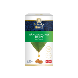 Manuka Health Mánuka Honey Drops packaging on a green background