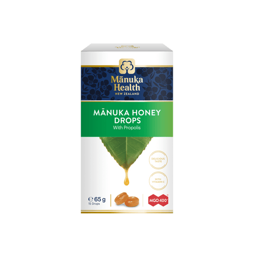 Manuka Health Mánuka Honey Drops packaging on a green background